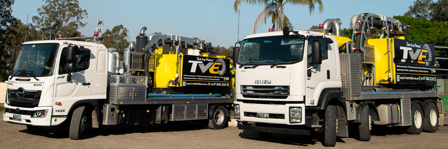 Images of two big vehicles on the way for drain cleaning in brisbane