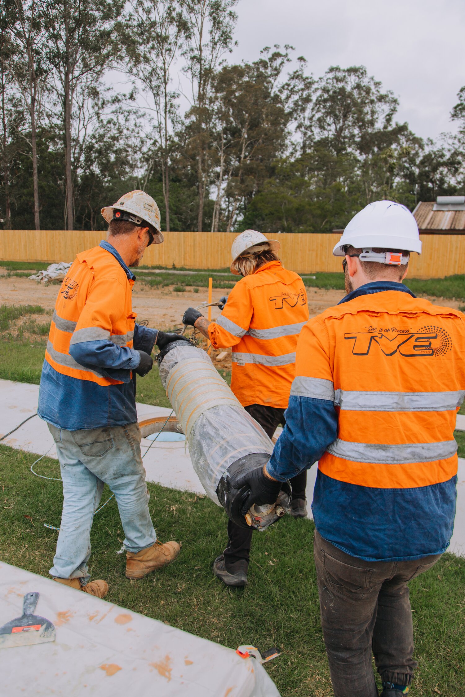 Image of group of workers performing pipe repair in Brisbane
